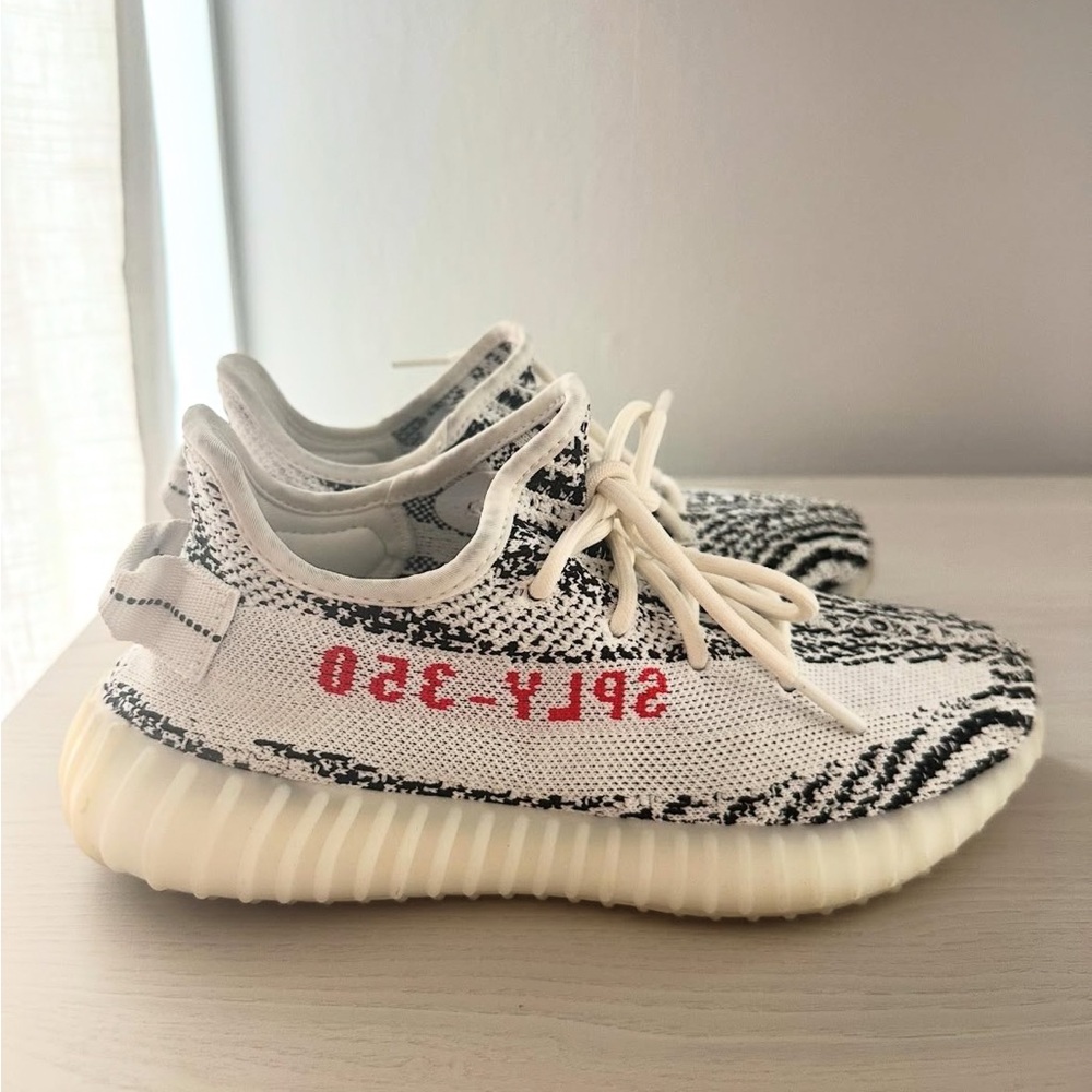 Yeezy Black and White Sneakers with Primeknit and Boost Cushioning